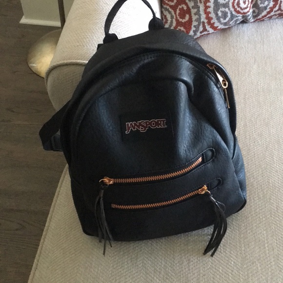 jansport black leather backpack